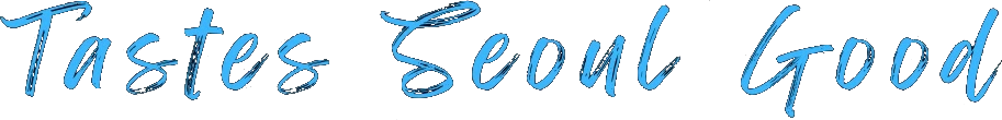 Tastes Seoul Good in title case in an informal baby blue brush script on a black background.